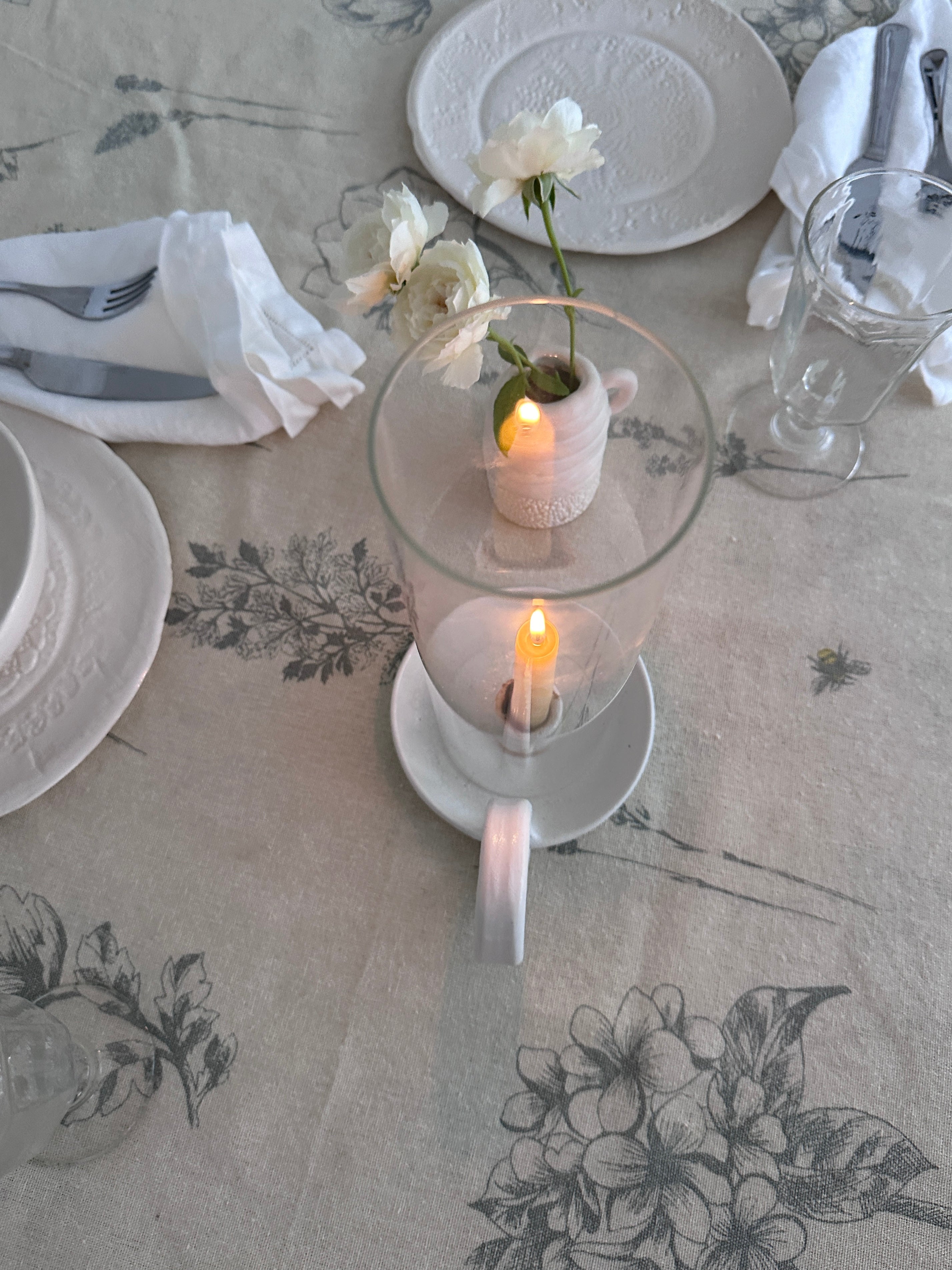 Handcrafted white ceramic candle holder with glass cover, perfect for wabi-sabi, farmhouse, and cottagecore decor. This versatile piece is an excellent gift for birthdays or holidays, providing a calming and elegant ambiance