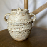 Handmade ceramic jar with lid in textured white glaze