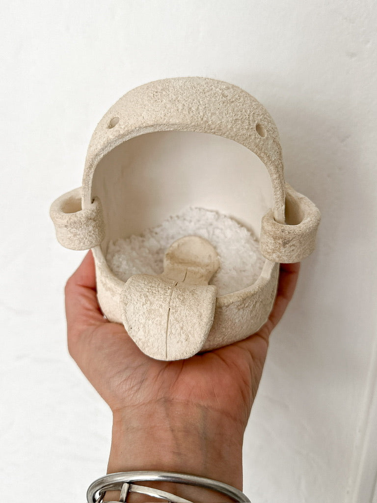 Handmade ceramic salt cellar with a wide opening for countertop salt