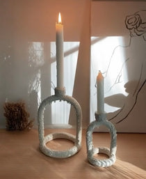 Handmade ceramic arc candlestick holders with arched silhouette by Muddy Heart