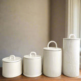 Customizable ceramic canisters for kitchen storage and decor