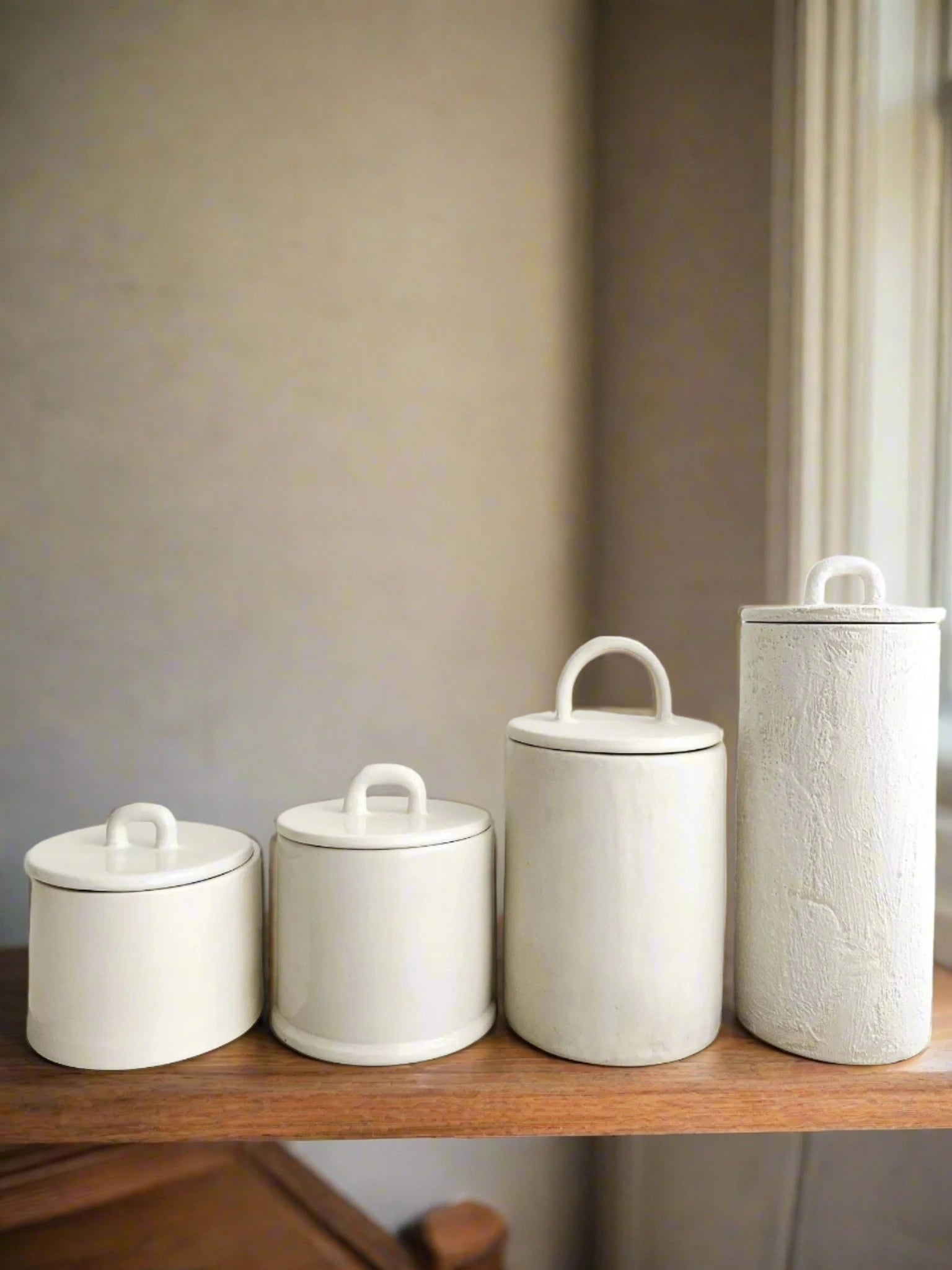 Customizable ceramic canisters for kitchen storage and decor