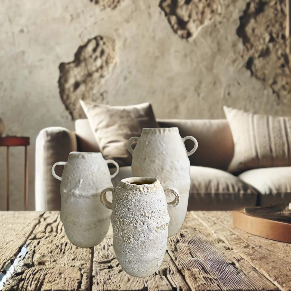 Rustic white ceramic vases with natural texture, perfect for adding a timeless touch to contemporary and mediterranean home interiors