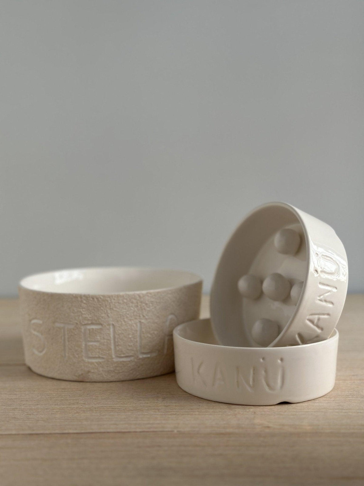 Personalized handmade ceramic pet bowl hand-lettered with a pet's name